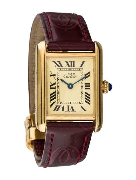 cartier tank must gold